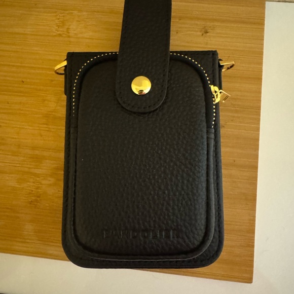 HAILEY HOLSTER
Crossbody Phone Case in Black/Gold - Picture 2 of 6